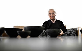 Herbert Krenchel Krenit bowls black on table Herbert in background